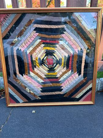 Framed Textile Art Piece Featuring Geometric Log Cabin Quilt Pattern 1