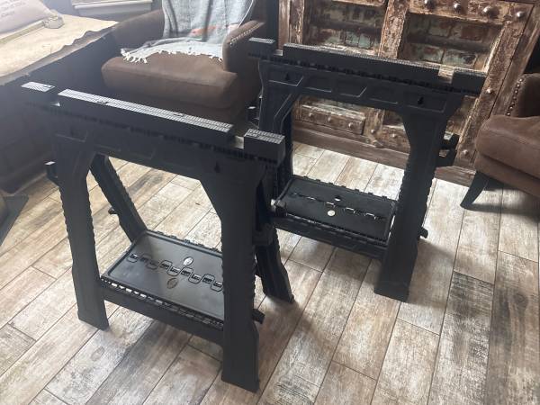 Two 31 inch plastic folding sawhorse (1,000 pound limit) 1