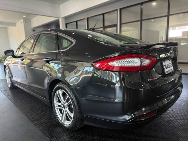 2015 Ford Fusion Titanium Híbrido Sedán 4D 4 Cilindros, Híbrido, 2.0 Litros - C - $7995.0063435710041475124