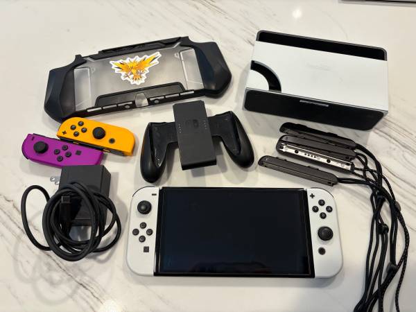 Nintendo Switch OLED with Extra Consoles 1