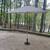 Patio Umbrella with iron base (8.5 foot wide) 1 thumbnail
