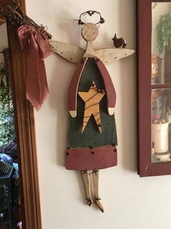 Adorable wooden angel. Made of solid wood 1/2" thick. 30" high from ha 1