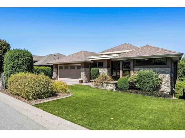 FABULOUS rancher w/basement in one of the BEST locations in Sunridge 1