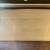 Cream colored ottoman with tan print 6 thumbnail