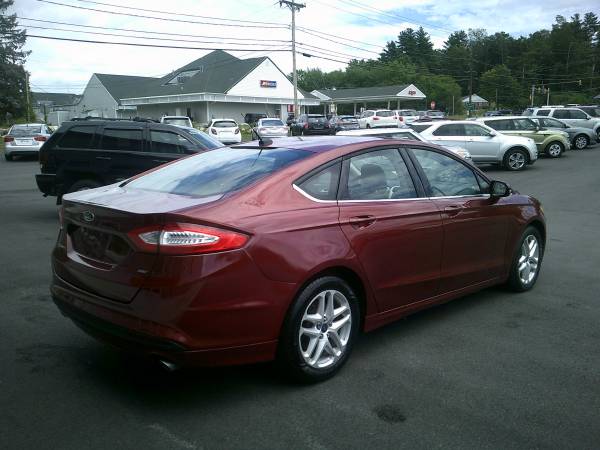 Ford Fusion SE Bluetooth, entrada auxiliar, automóvil limpio y confiable **1 año de garantía** - $6.995 (**Garantía nacional de 1 año/12.000 millas**)63437569683715124
