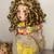 Vintage Porcelain Doll Wearing a Yellow Dress 7 thumbnail