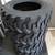 4 new strong guard 10-16.5 / 10 ply skid steer tires with rim guard 2 thumbnail