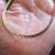 18 inches of 14K Yellow Gold Herringbone Necklace that goes around 12 thumbnail
