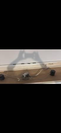Chic display unit with overhead lighting 1