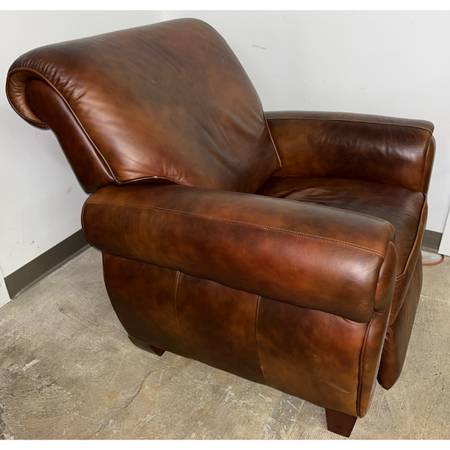 Brown oversized recliner. Recline is a little stiff at first 1