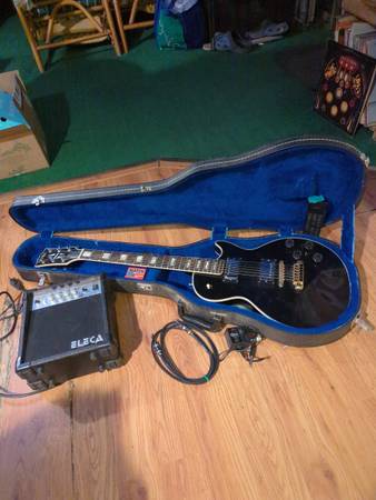 Guitar, electric, and case and speaker 1