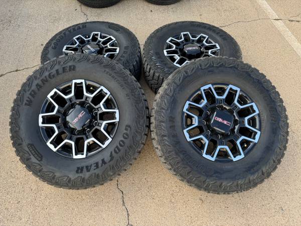 GMC sierra 2500 at4x OEM wheels and tires new 1