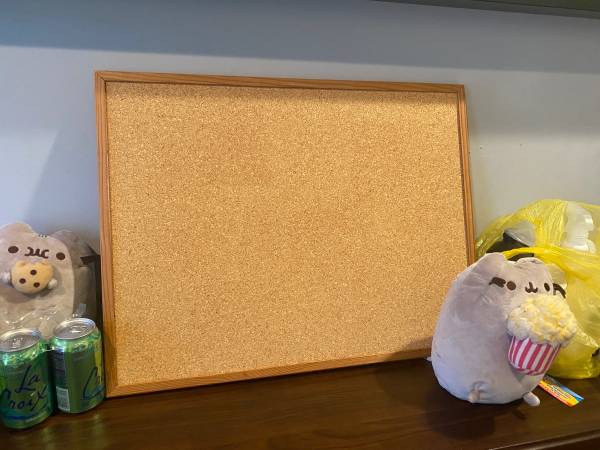 25"w x 19”h cork board with oak wood frame 1