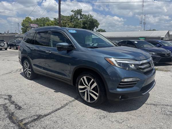 IMMACULATE 2016 HONDA PILOT TOURING AWD WITH ONLY 128K MILES 1