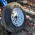 13" trailer tire and wheel. 4 lug new/un-used, older 2 thumbnail