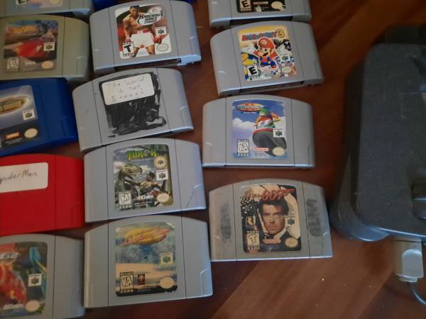 Nintendo 64 with controllers and a bundle of games - $150 (Pinson)63471122870787122