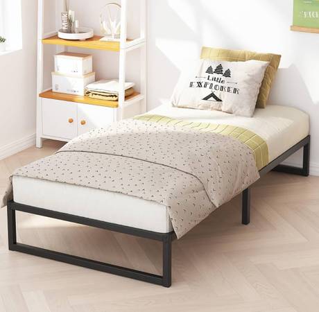 Twin XL-size bed and mattress. 1