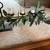 WROUGHT IRON TABLE CANDELABRA WITH EUCALYPTUS AND VOTIVES 4’ LONG 3 thumbnail