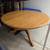5' wood round three footed pedestal dining table 1 thumbnail