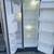 Amana stainless steel side by side refrigerator works but needs adjustments 2 thumbnail