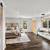 Downstairs is a large family/gaming room with a full bath and an exerc 13 thumbnail