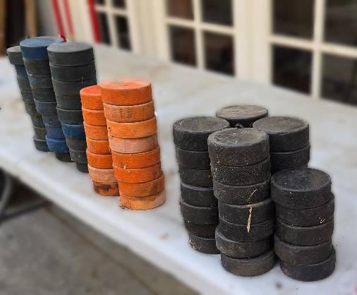 Hockey Pucks - 69 of them 1
