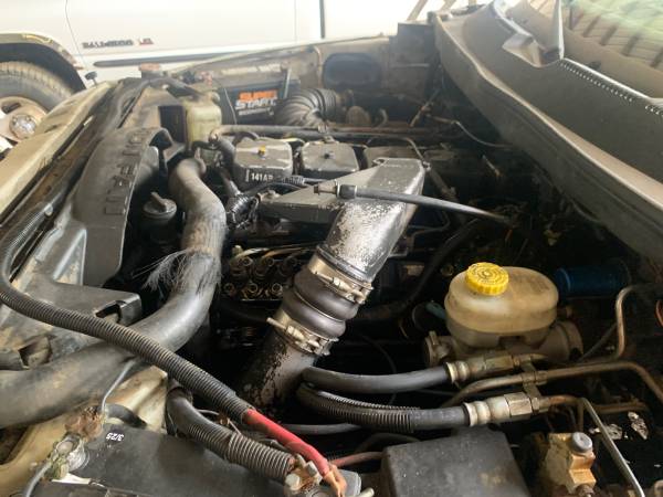 1998 Dodge Ram 3500 Dually Flatbed 5.9 Cummins Turbo Diesel 5 Speed - $3,950 (Middleton)62954472840451121