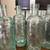 4 - 8 1/2”Vintage Glass Bottles light green 1 thumbnail