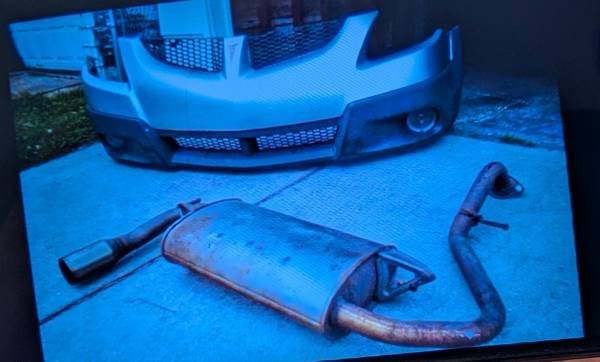 2003 Pontiac Vibe bumper cover and muffler 1