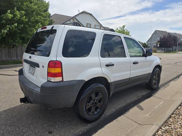 2006 Ford Escape XLT V6 4WD Conduce genial! ¡Emisiones recientes! - $3,250 (Greeley)63619741321987123