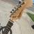 Good condition used red Squier Mini guitar + strings 4 thumbnail