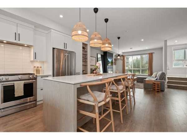 Stunning 4 bed, 4 bath townhome built in 2021, steps to Garrison! 1