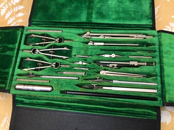 Vintage Technical drafting instrument set in a folding black case... 1