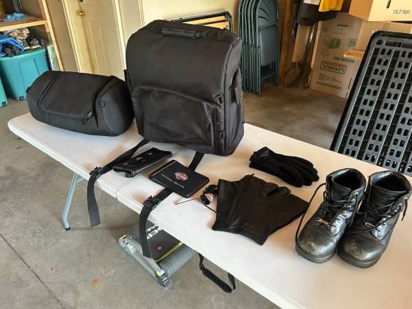 Harley Davidson, backpack roll pack size 8 boots pair of gloves and a couple wal 1
