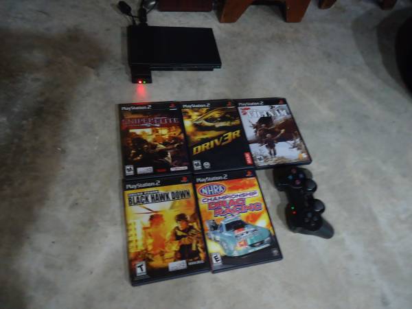 PlayStation 2 slim with games 1