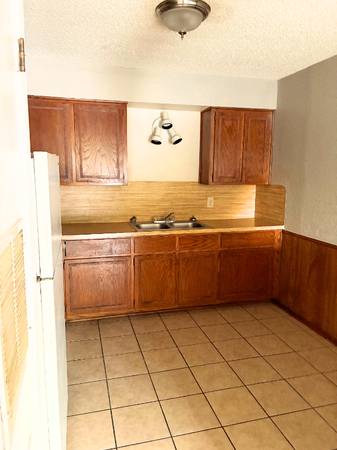2 Bed Downstairs unit WITH WATER AND TRASH INCLUDED READY FOR RENT 1