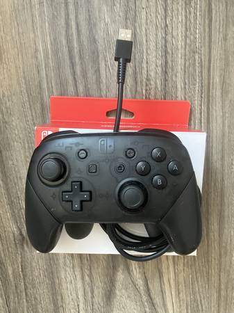 Nintendo Switch + Switch Pro Controller + Zelda TOTK - $200 (Downtown)63440994565251121