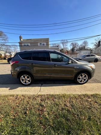 2015 Ford Escape Titanium Sport Utility - $8,900 (Hempstead)63654716138625123