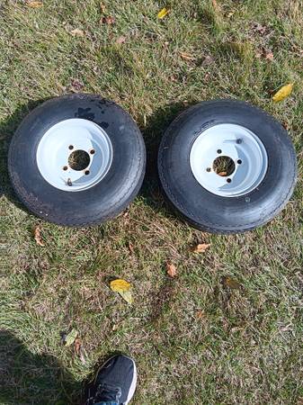 Barely used Utility Trailer Tires and Rims 1