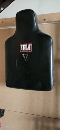Title strike / body shield 1