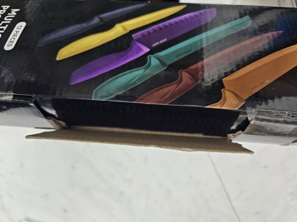 Brand new ceramic multicolor knife set. 1