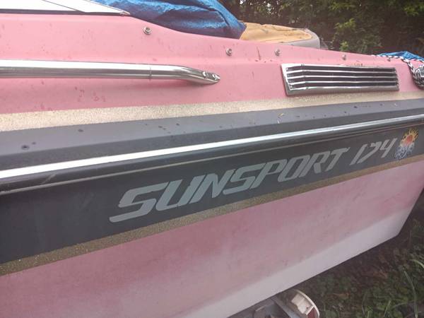 Baja  sunsport red  boat on  trailer 1