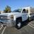 2016 Chevrolet 3500 Stake bed,6.0L Gas,2,000lbs power lift gate!  1 thumbnail
