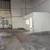 Large building with warehouse/flex spaces, office spaces and parking. 7 thumbnail