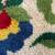 hand hooked rug with stylized floral motif. 3 thumbnail