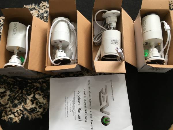 Revo Wireless 4-Channel NVR 1TB Surveillance System with 4 Full HD Bul 1