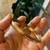 Solid Yellow Gold Bangle open from the side with Beautiful Design 1 thumbnail