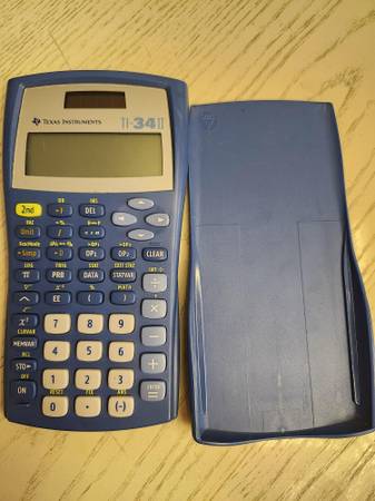 Texas Instruments 34 Calculator, works well. 1