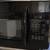 Used Black GE Over the Range Microwave/hood 30” Width 2 thumbnail