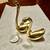 Solid brass miniature swans 1 thumbnail